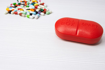 Pillbox and medication capsules