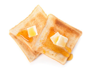 Tasty toasted bread with honey and butter on white background