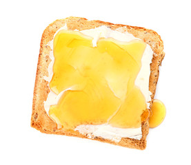 Tasty toasted bread with honey and butter on white background