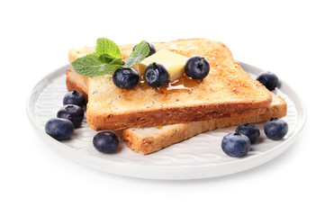Tasty toasted bread with honey, butter and berries on white background
