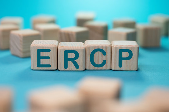 ERCP word from wooden blocks on blue background