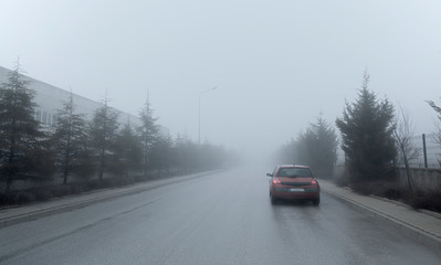 Obraz na płótnie Canvas Heavy traffic at fog weather