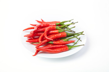 A pile of fresh red peppers