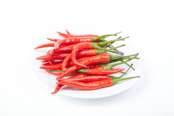 A pile of fresh red peppers