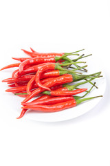 A pile of fresh red peppers