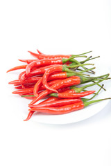 A pile of fresh red peppers