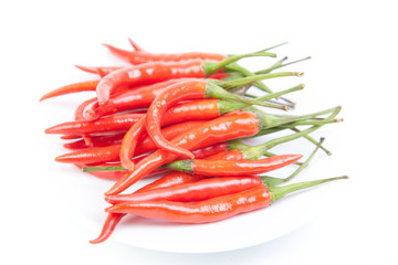 A pile of fresh red peppers