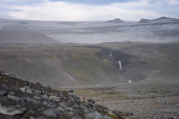 Volcanic landscape with glacier, rocks and ash on the Fimmvorduhals hiking trail. Iceland