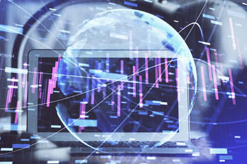 Financial graph colorful drawing and table with computer on background. Double exposure. Concept of international markets.