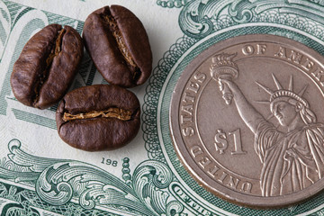 Coffee beans and US dollars. Fair Trade. Commodity trade.