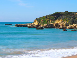 Romantic coast of Albufeira in Portugal with blue Atlantic ocean