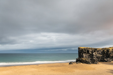 Snaefellsness national park in Iceland Skardsvik Beach during full moon night long exposure