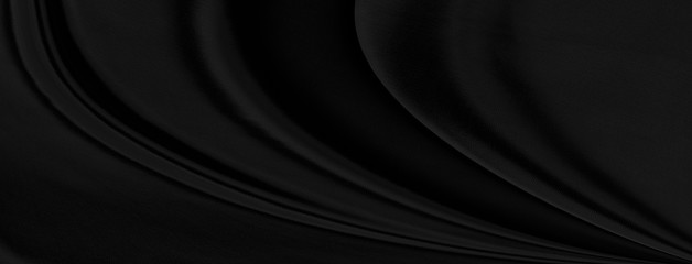Fototapeta premium Black gray satin dark fabric texture luxurious shiny that is abstract silk cloth background with patterns soft waves blur beautiful.