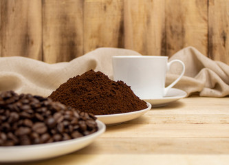 Fototapeta na wymiar Stage coffee bean, powder, cup of coffee