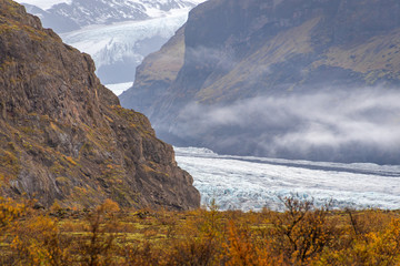 Vatnajoekull glacier old ice pushing through canyon down the mountain