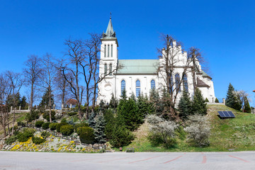 MSZANA DOLNA, POLAND - APRIL 07, 2019: The Michael Archangel church - obrazy, fototapety, plakaty