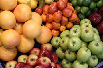 Various fresh summer exotic fruits for sale on market