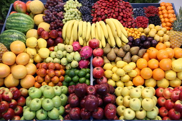 Various fresh summer exotic fruits for sale on market