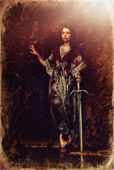Obraz na płótnie Canvas Woman with sword in lake near waterfall, old photo effect.