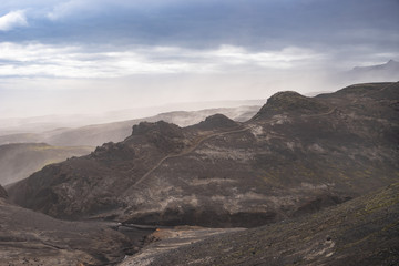 Volcanic landscape during ash storm on the Fimmvorduhals hiking trail. Iceland