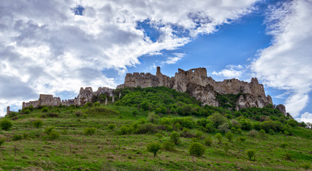 Fototapeta na wymiar Spisky gothic castle in summer with clouds, Slovakia