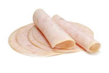 Slices of chicken ham isolated on white
