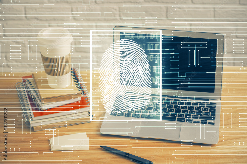 Poster Computer on desktop in office with finger print drawing. Double exposure. Concept of business data security.