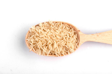 rice in a spoon. rice close up