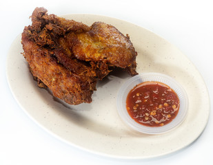 Fired Chicken on a plate with sambal