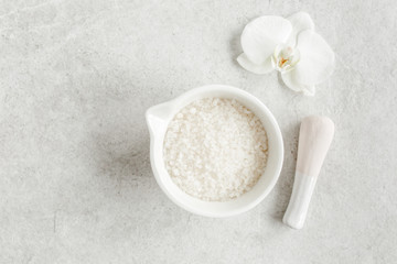 Plakat Spa skincare concept. Natural/Organic spa cosmetics products, sea salt on gray marble table from above. Spa background with a space for a text, flat lay, top view.