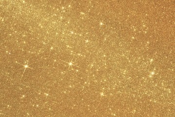 Golden abstract background with stars reflecting the light