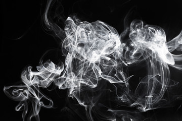 White smoke on a black background