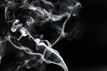 White smoke on a black background