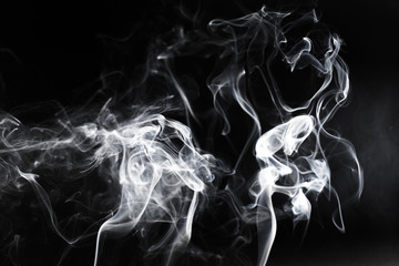 White smoke on a black background
