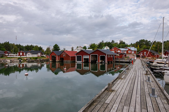 Finland, Aland Islands, Lappo, Lappo island and city located on the Aland Islands archipelago in the very south of Finland. beautiful view of the pier under the roof for yachts and boats.