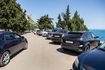 Cars on a parking near the sea coast