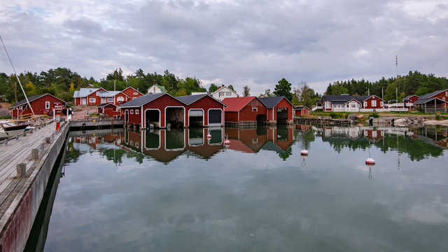 Finland, Aland Islands, Lappo, Lappo island and city located on the Aland Islands archipelago in the very south of Finland. beautiful view of the pier under the roof for yachts and boats.