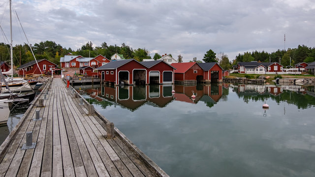 Finland, Aland Islands, Lappo, Lappo island and city located on the Aland Islands archipelago in the very south of Finland. beautiful view of the pier under the roof for yachts and boats.
