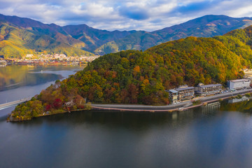 Japan. Kawaguchiko mountain landscape. Kawaguchiko in the fall. Cities at the foot of mountains in Japan. Five lakes of Fuji. Landscape of Japan from a drone. Guide to the countries of Asia.