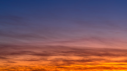 Fototapeta na wymiar Sunset sky with colored clouds. Abstract background