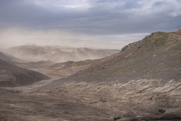 Fototapeta na wymiar Volcanic landscape during ash storm on the Fimmvorduhals hiking trail. Iceland