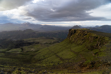 Obraz premium Canyon and Mountain peak during dramatic and colorful sunset on the Fimmvorduhals Hiking trail near Thorsmork