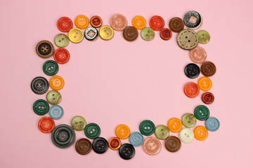 Frame of various sewing buttons with space for text