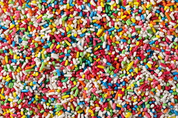 Fototapeta na wymiar Colorful candy sprinkles background and texture