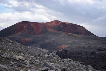 Volcanic landscape with red geological formation on the Fimmvorduhals hiking trail. Iceland