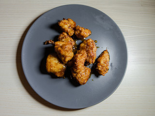 Korean fried chicken with honey soy glaze.