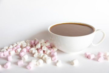 Marshmallow with coffee or hot chocolate on a white background, sweet food background