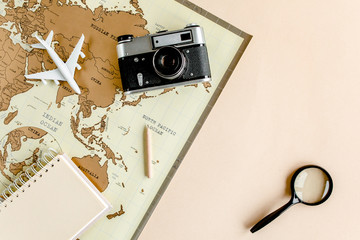 Planning vacation, travel plan, trip vacation using world map along with other travel accessories....