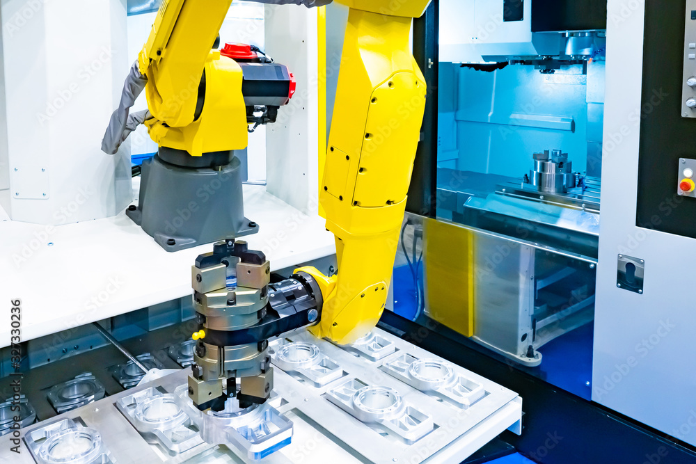 Poster robotics. aluminium and the arm of an industrial robot. automated production of aluminum products. a