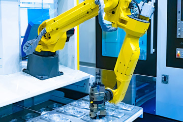Automated production of aluminum products. Aluminum and industrial robot. The robot makes aluminum...
